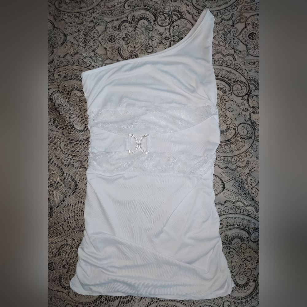 One shoulder white top